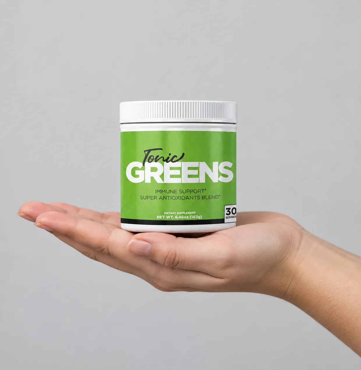 TonicGreens — the package held in a hand